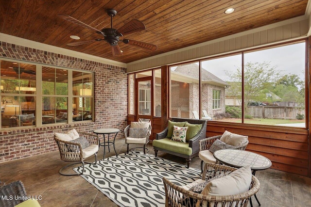 sunroom / solarium with outdoor lounge area and a ceiling fan