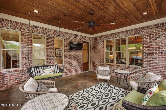 view of patio with outdoor lounge area and a ceiling fan