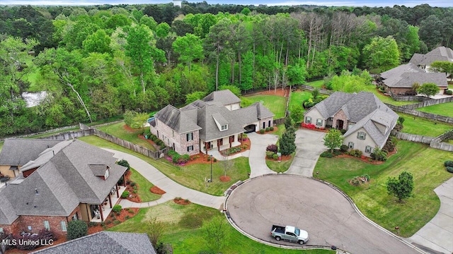 bird's eye view with a view of trees and a residential view