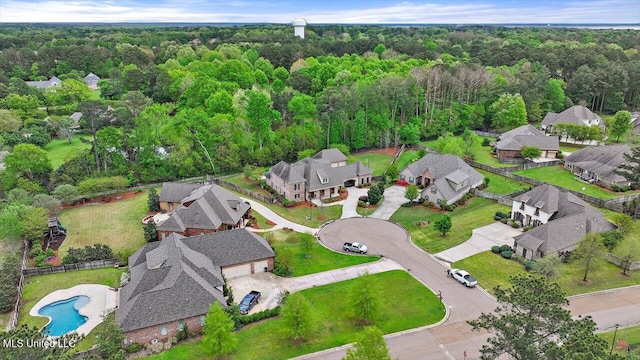 aerial view with a view of trees and a residential view