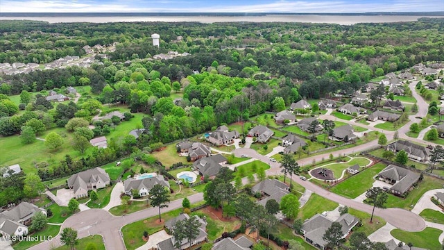 birds eye view of property with a residential view