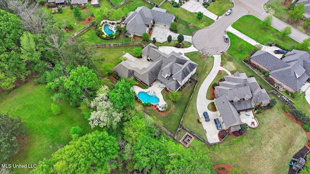 birds eye view of property with a residential view