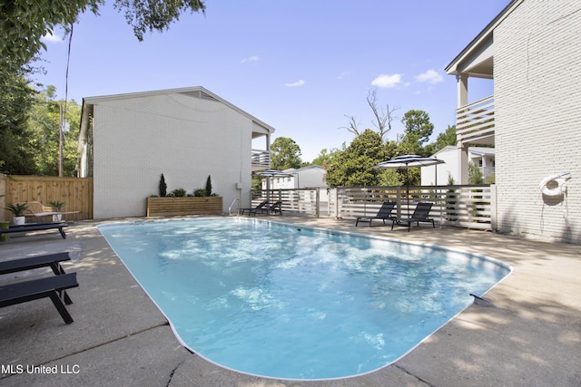 view of pool with a patio