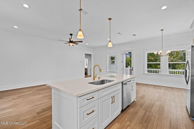 kitchen featuring light hardwood / wood-style flooring, an island with sink, stainless steel appliances, sink, and white cabinets