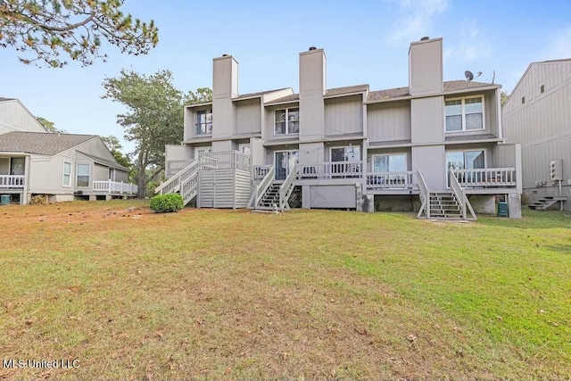 221 Highpoint Dr, Diamondhead, MS 39525 - rear view of property with a lawn