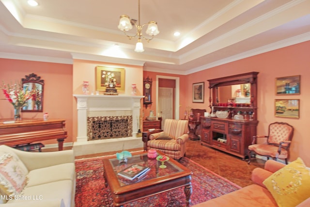 living room featuring a notable chandelier, ornamental molding, tile patterned floors, and a raised ceiling