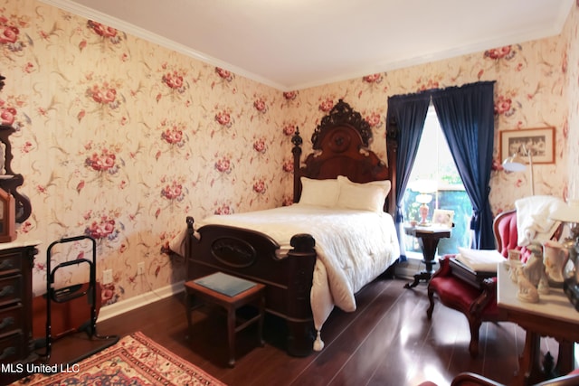 bedroom featuring crown molding and dark hardwood / wood-style floors