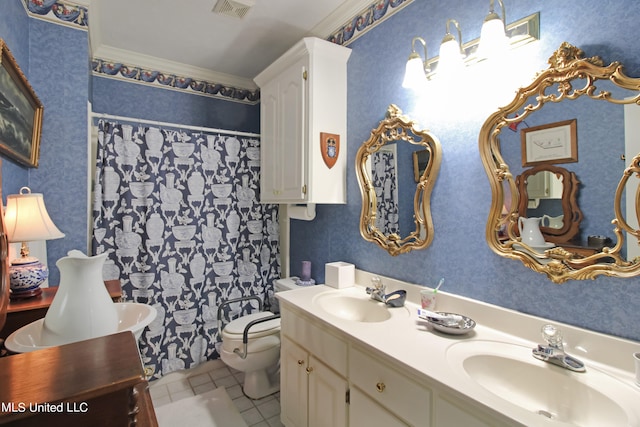 bathroom featuring toilet, crown molding, vanity, and tile patterned floors