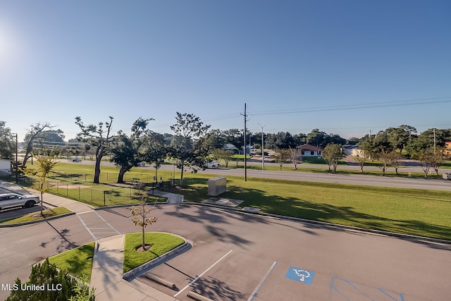 view of community featuring a yard