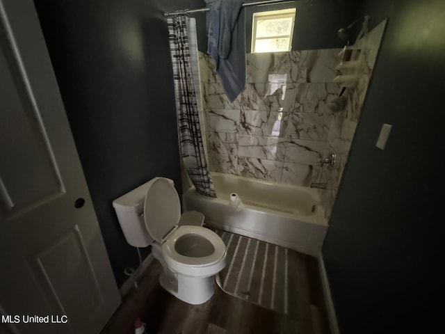 bathroom featuring toilet, shower / bath combination with curtain, and wood-type flooring