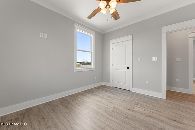 unfurnished room featuring ceiling fan, ornamental molding, and light wood-type flooring