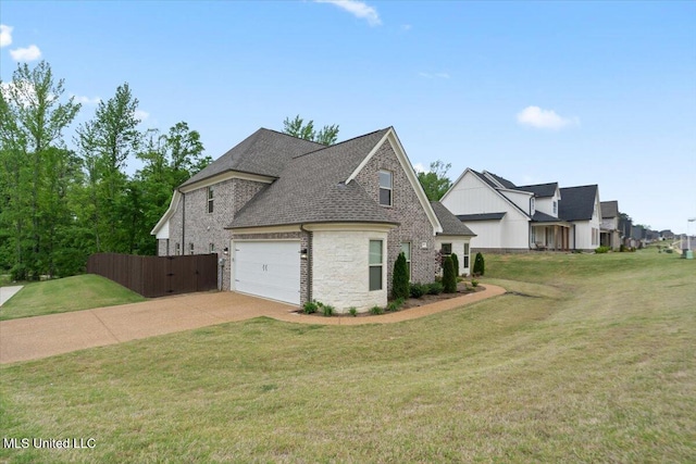 view of property exterior with a yard, driveway, fence, an attached garage, and a shingled roof