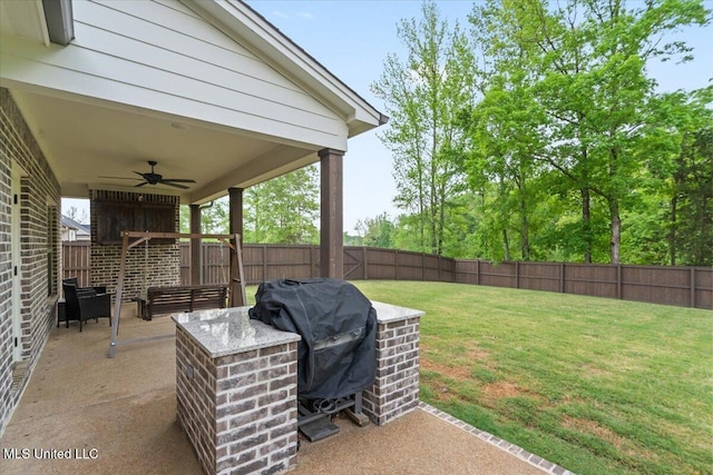 view of yard with a fenced backyard, a patio area, an outdoor living space, and a ceiling fan