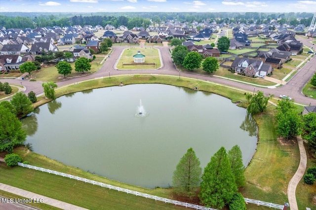 bird's eye view with a water view and a residential view