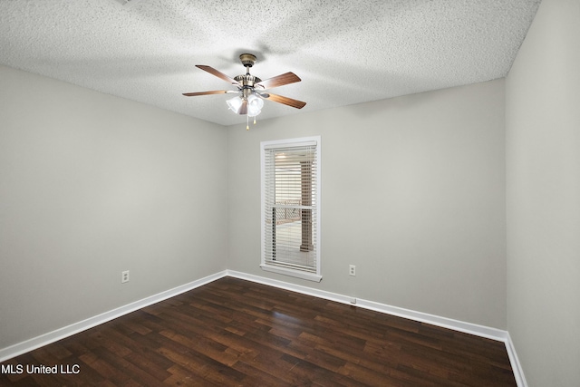 unfurnished room featuring ceiling fan, dark hardwood / wood-style floors, and a textured ceiling