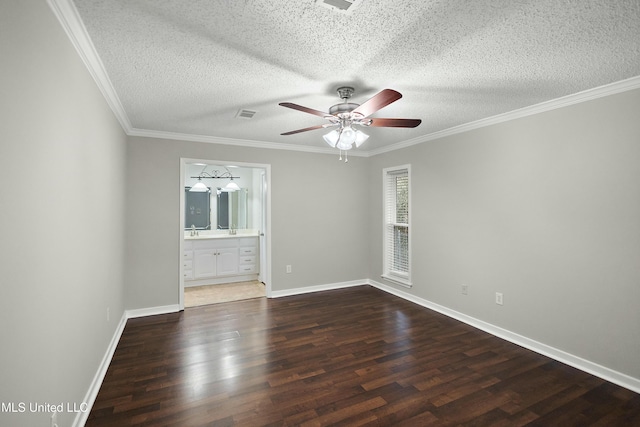 unfurnished room with a textured ceiling, dark hardwood / wood-style floors, and ornamental molding