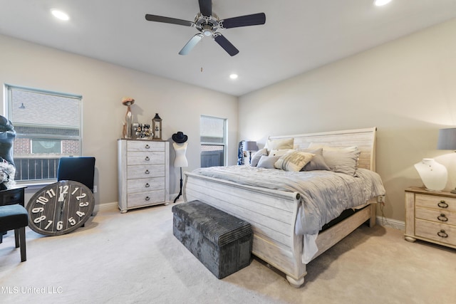 carpeted bedroom with ceiling fan, baseboards, and recessed lighting