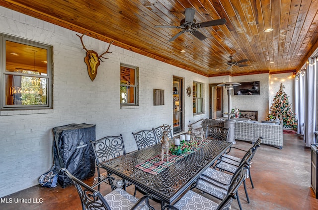 view of patio featuring ceiling fan