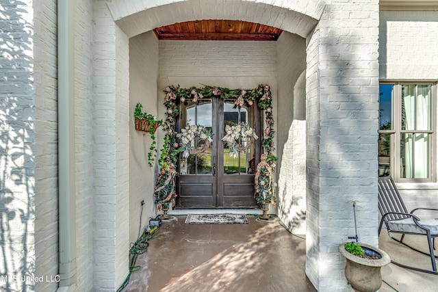 entrance to property featuring french doors