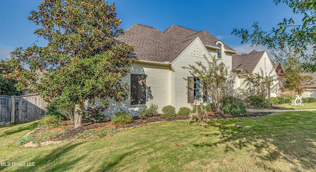 view of front of home with a front yard