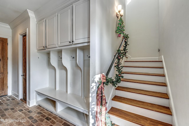 mudroom with crown molding