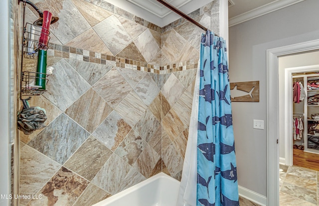 bathroom featuring ornamental molding and shower / tub combo with curtain