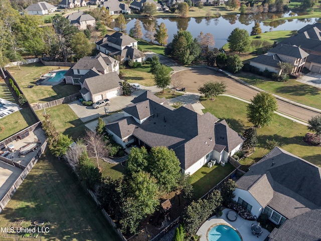 drone / aerial view with a water view