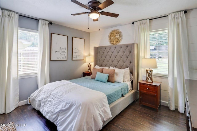 5751 Orchardview Dr, Jackson, MS 39211 - bedroom with multiple windows, dark wood finished floors, and a ceiling fan