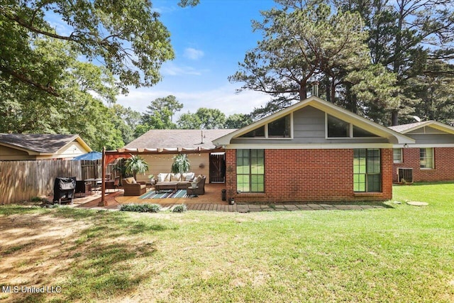 5751 Orchardview Dr, Jackson, MS 39211 - rear view of property with an outdoor hangout area and brick siding