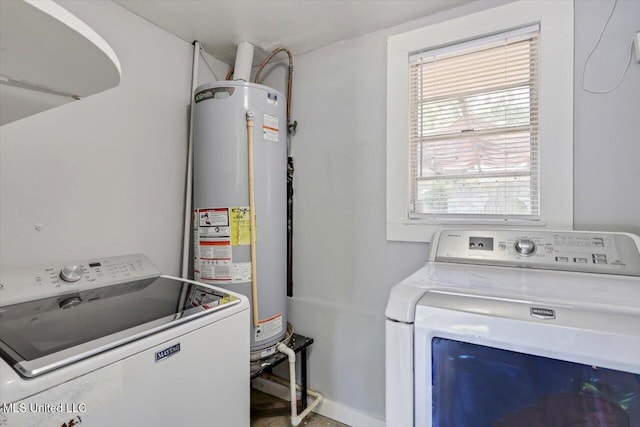 5751 Orchardview Dr, Jackson, MS 39211 - laundry area with water heater and separate washer and dryer