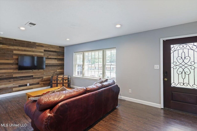 5751 Orchardview Dr, Jackson, MS 39211 - living area with wooden walls, wood finished floors, baseboards, recessed lighting, and an accent wall