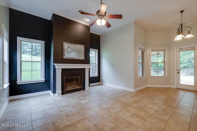 unfurnished living room featuring ornamental molding, light tile patterned flooring, and ceiling fan with notable chandelier