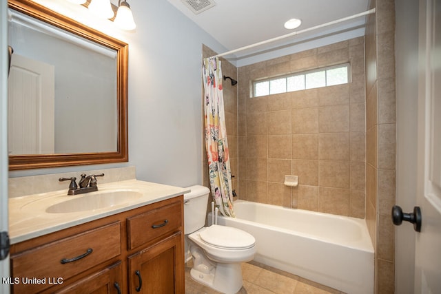 full bathroom with vanity, toilet, tile patterned floors, and shower / bath combo with shower curtain