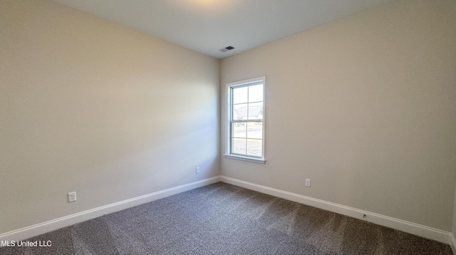 view of carpeted spare room