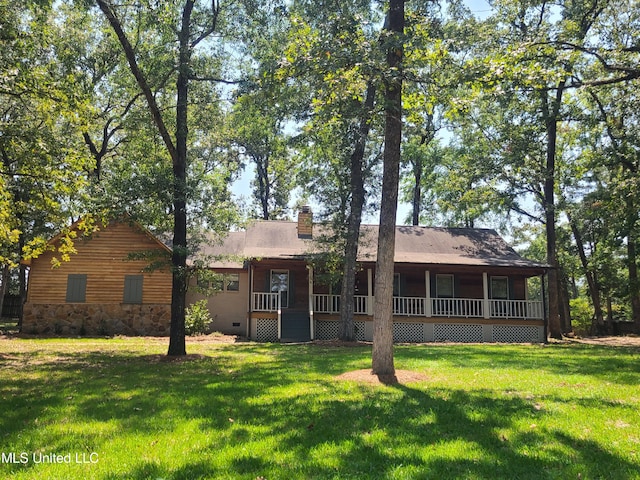 ranch-style house featuring a front lawn