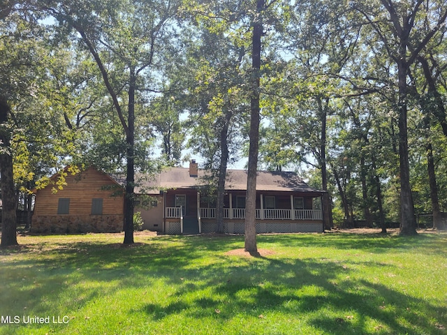 exterior space with a yard