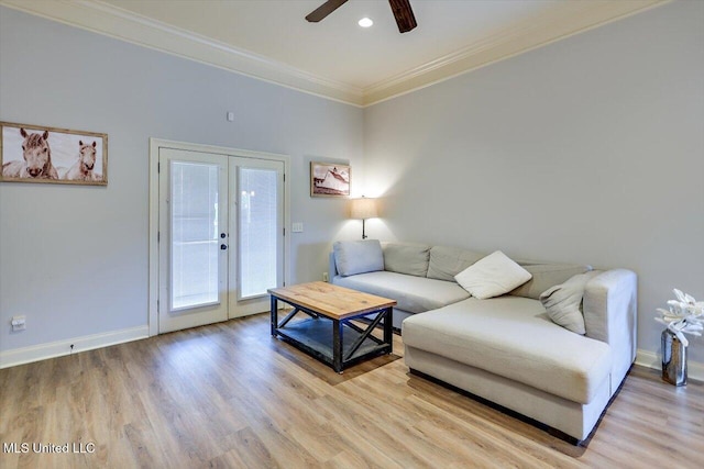 106 Sumter Dr, Canton, MS 39046 - living area featuring french doors, crown molding, light wood finished floors, ceiling fan, and baseboards