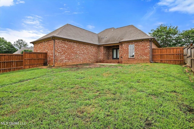 106 Sumter Dr, Canton, MS 39046 - rear view of property featuring brick siding and a shingled roof