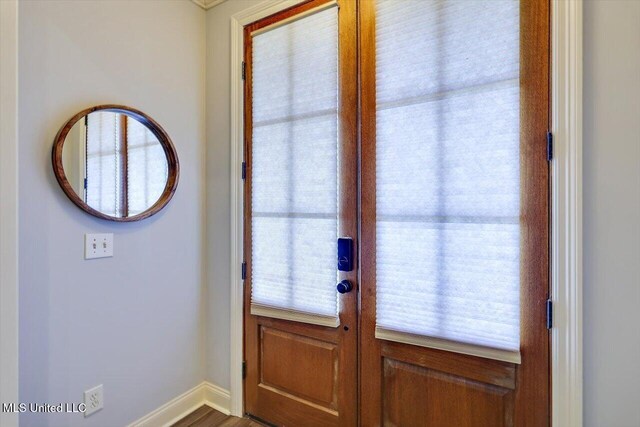 106 Sumter Dr, Canton, MS 39046 - doorway to outside featuring french doors and baseboards