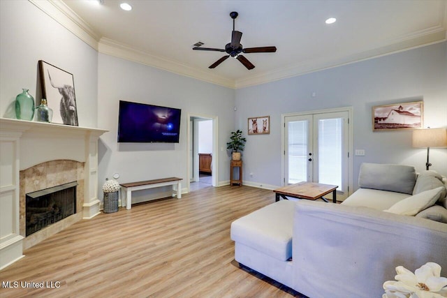 106 Sumter Dr, Canton, MS 39046 - living area with ornamental molding, ceiling fan, french doors, light wood-style flooring, and recessed lighting