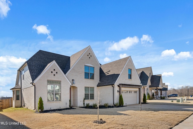 french country inspired facade with a garage