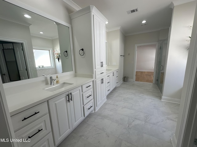 bathroom featuring vanity and crown molding