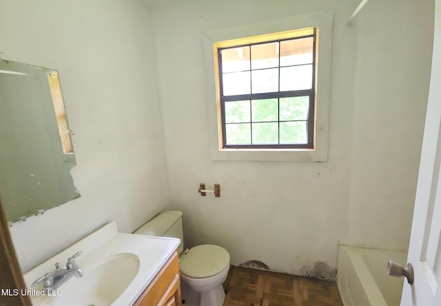 1124 J J Carter Rd, Magnolia, MS 39652 - bathroom with a tub to relax in, toilet, and vanity