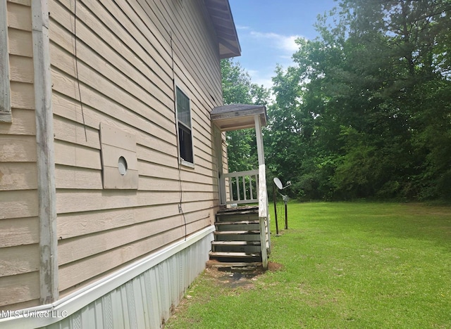 1124 J J Carter Rd, Magnolia, MS 39652 - view of home's exterior featuring a lawn