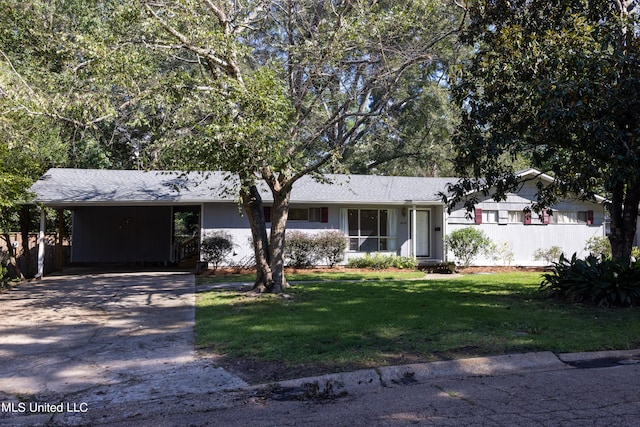 ranch-style home with a carport and a front yard