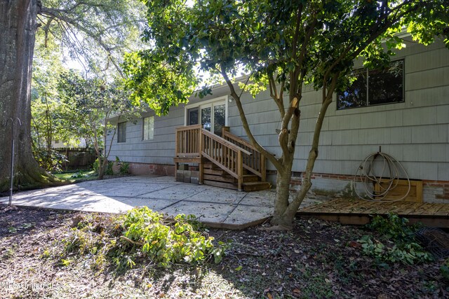 rear view of property with a patio area