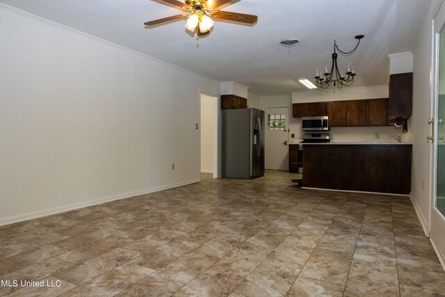 kitchen featuring crown molding, stainless steel appliances, dark brown cabinets, and ceiling fan with notable chandelier