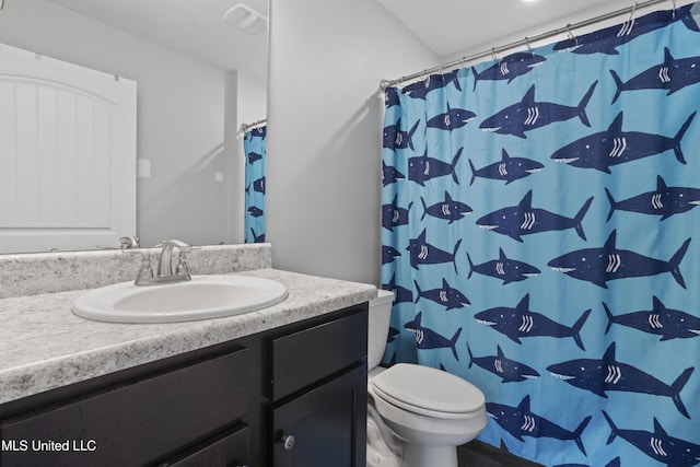 full bathroom with vanity, a shower with shower curtain, toilet, and visible vents