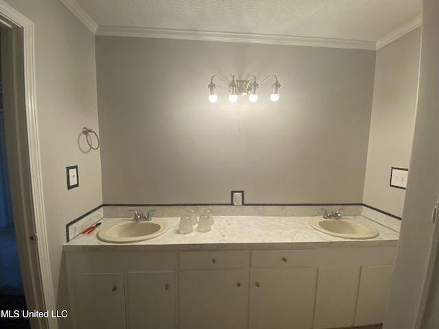 bathroom with vanity and ornamental molding