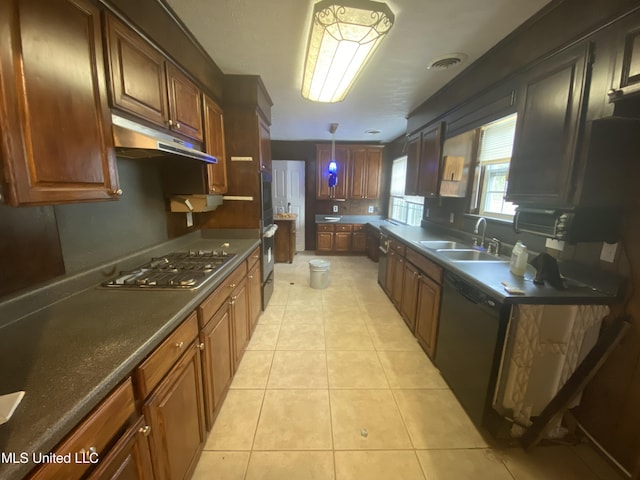 kitchen with dishwasher, hanging light fixtures, sink, light tile patterned floors, and stainless steel gas cooktop